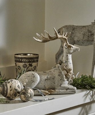 AURORA CELEBRATION STAG LYING DOWN