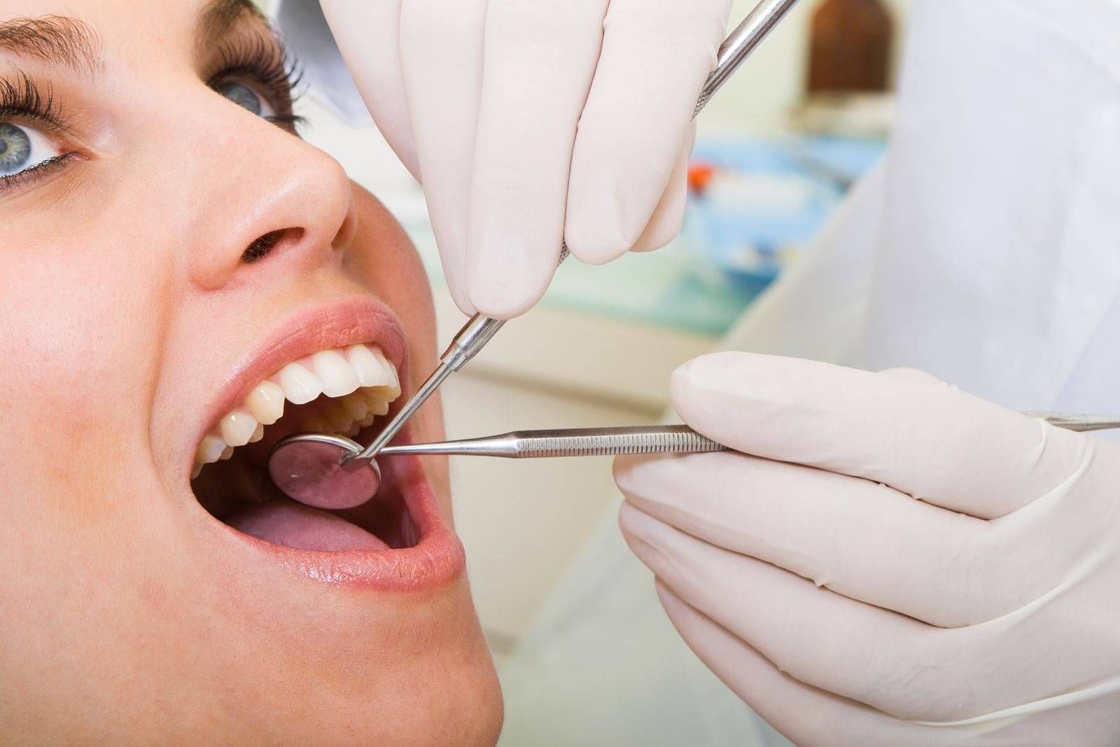 Dentist working on patient