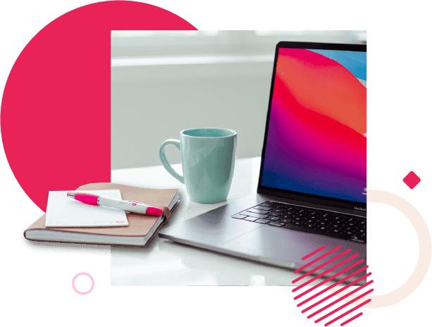 Laptop with a vibrant screen, a mint green mug, and notebooks with a pink pen on a white desk, framed by abstract pink shapes