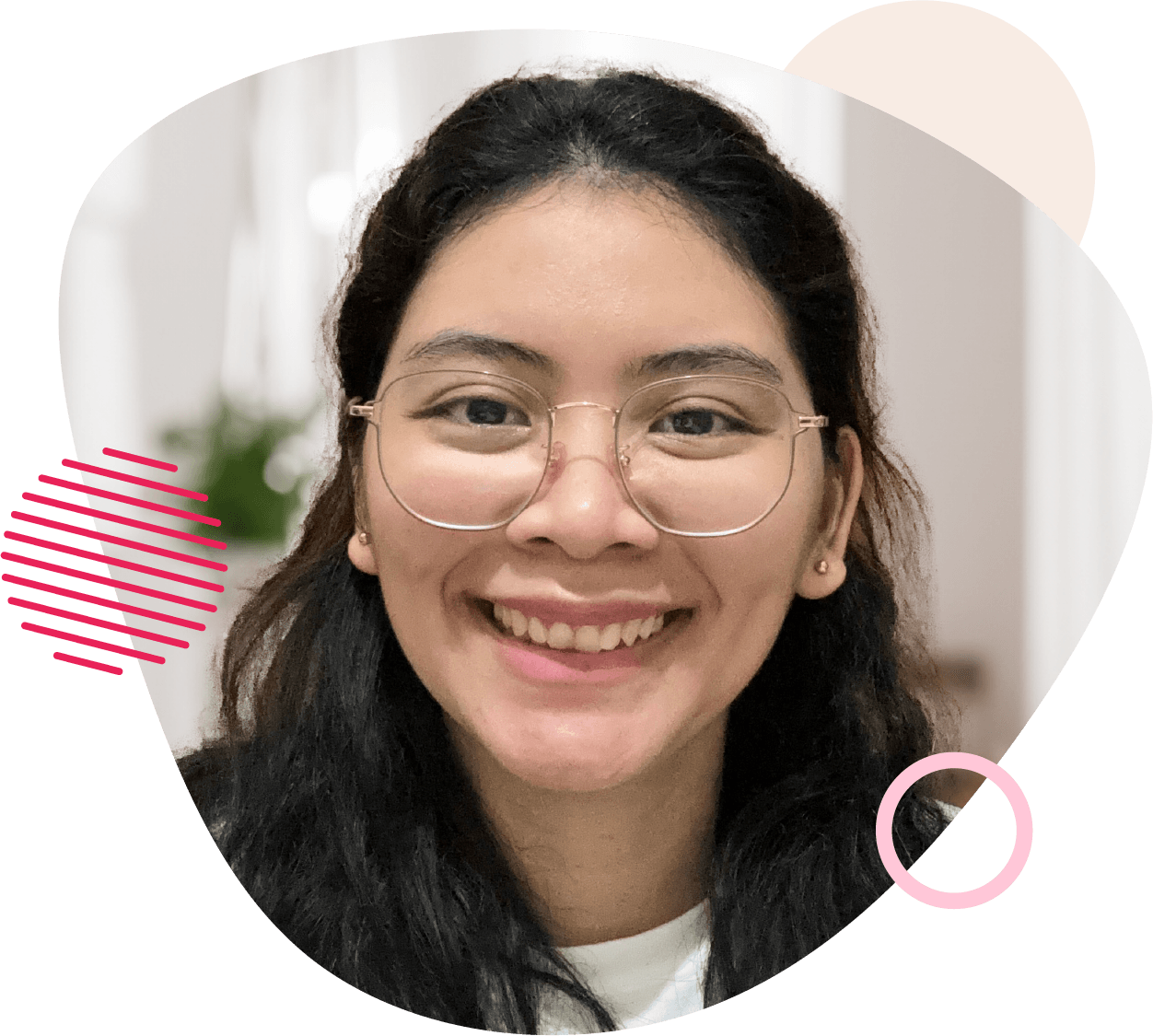 "A smiling woman with long hair, wearing a red checked dress, with abstract green and pink circles in the background