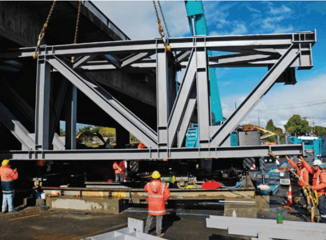 PTG steel stresbar being crane lifted during construction
