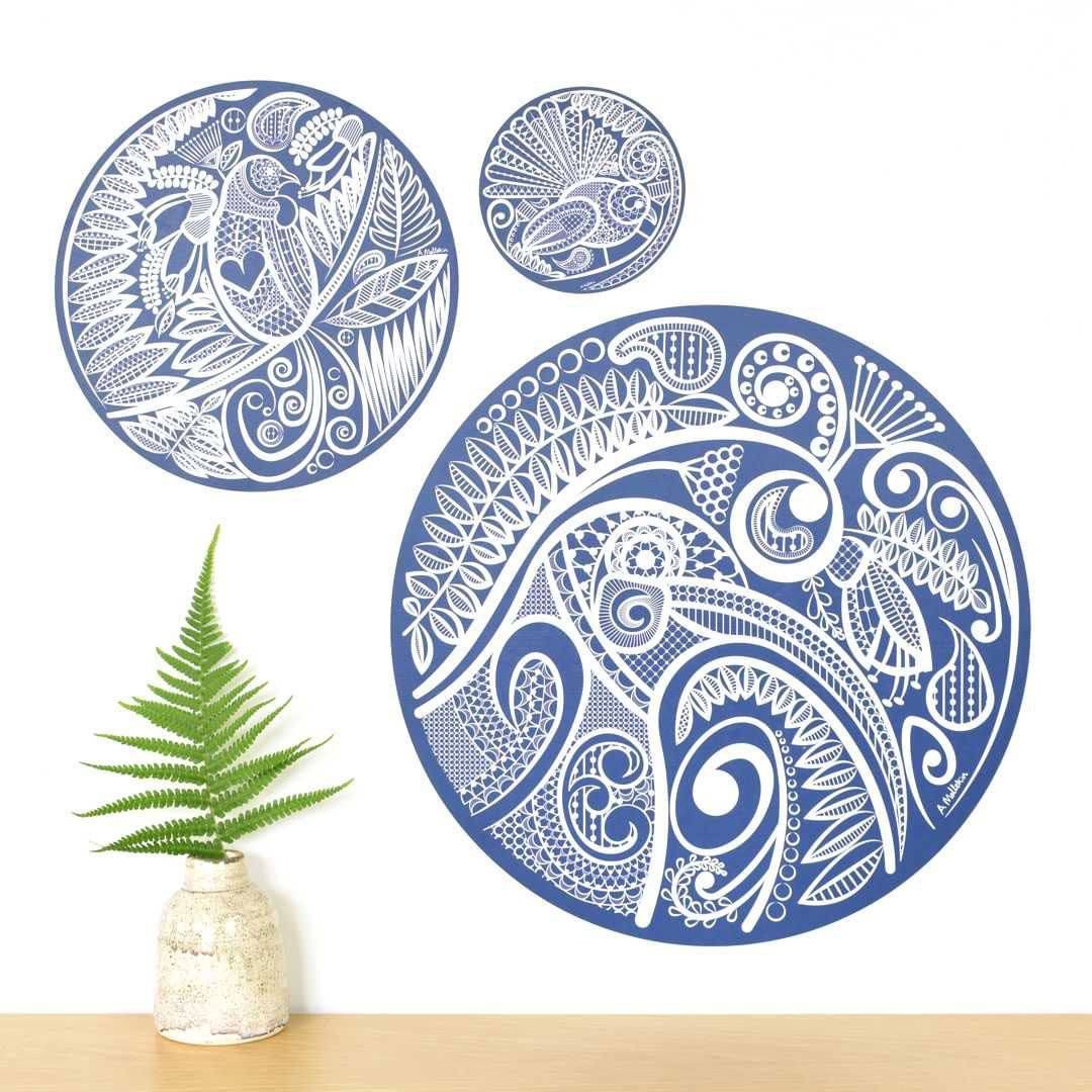 Three native bird wall decals by Anna Mollekin on a white wall