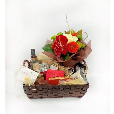Gourmet gift basket with flowers