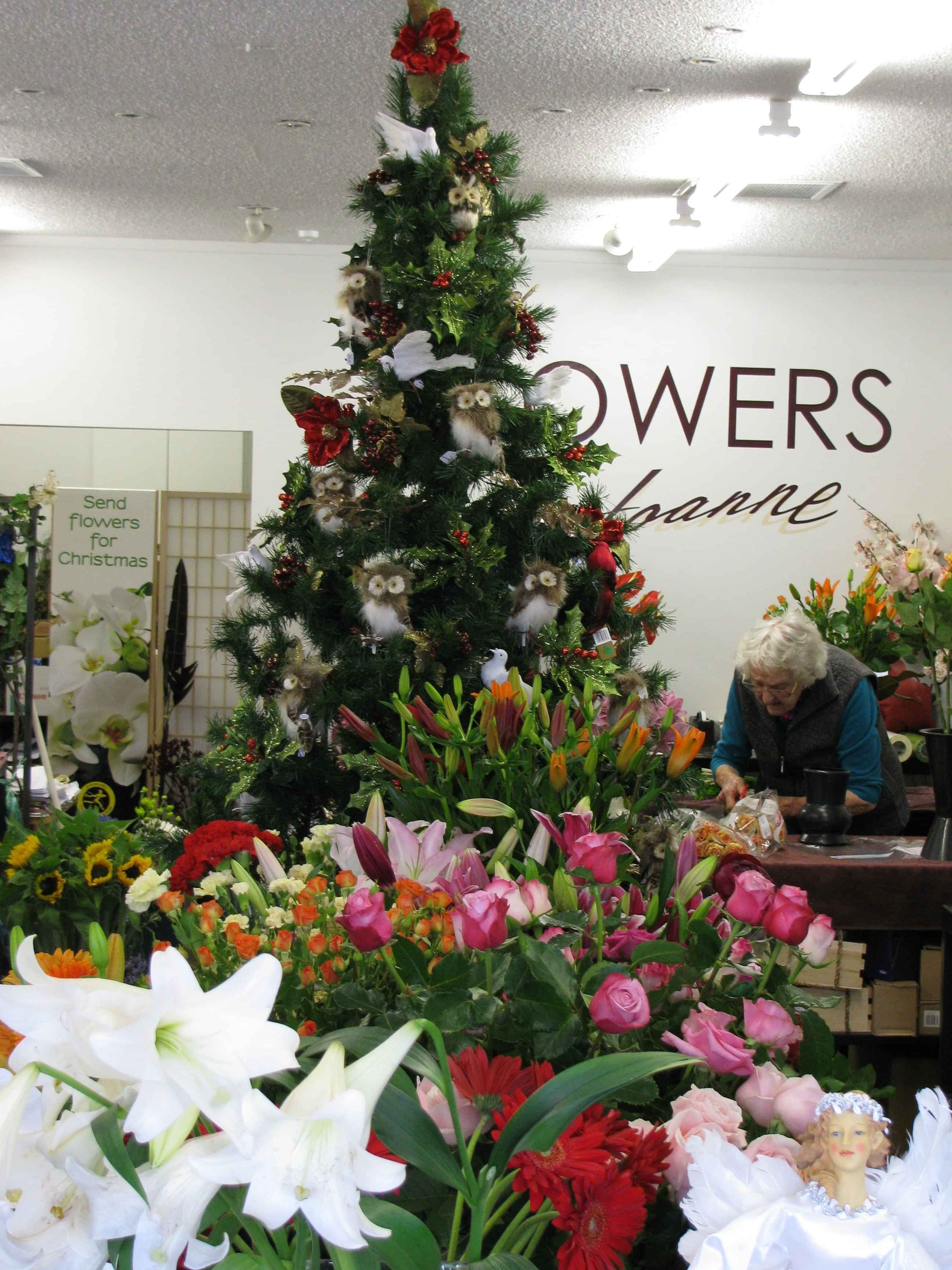 Margaret Christie helping at Flowers by Joanne shop during Barbarer ownership Orewa