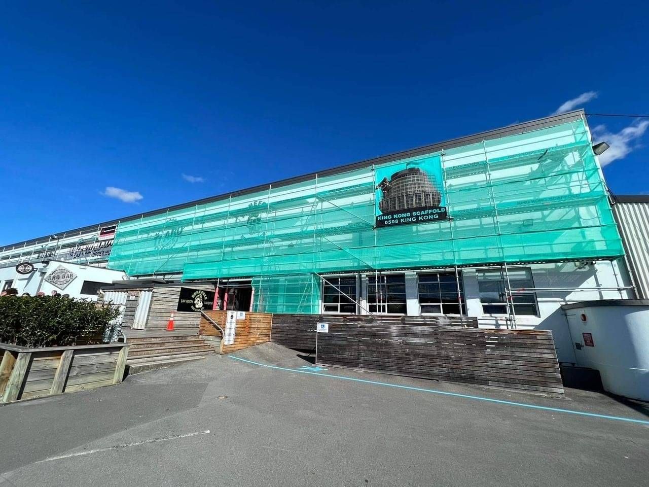 King Kong Scaffold providing full scaffolding wrap on a commercial building, highlighting expert scaffolding hire Wellington services.