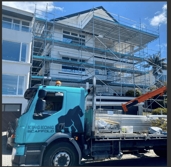 King Kong Scaffold truck and full scaffolding setup on a multi-storey house, showcasing expert scaffolding hire Wellington services.