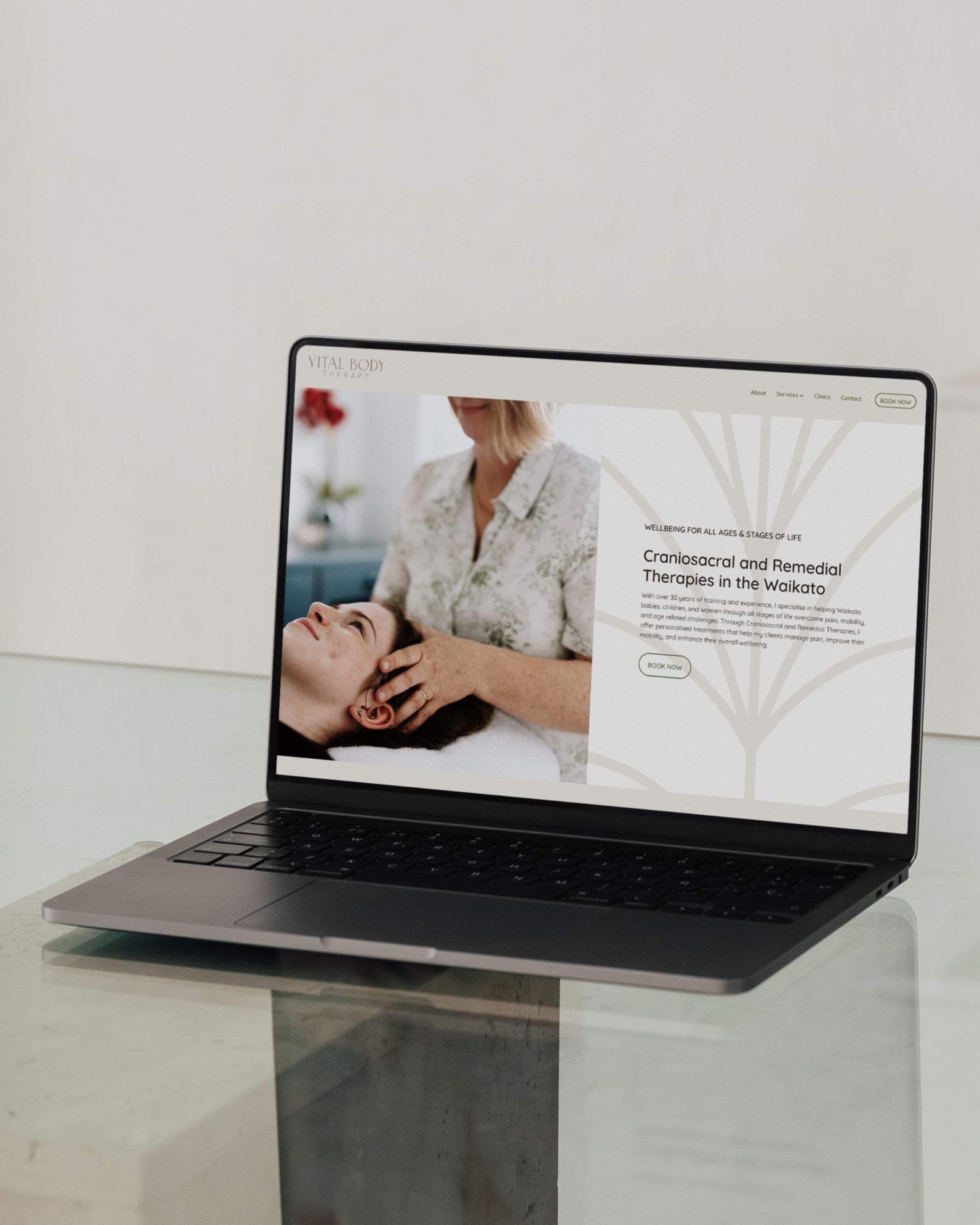 Image of laptop and Vital Body Therapy website. Designed by Creative Box. Waikato, New Zealand.