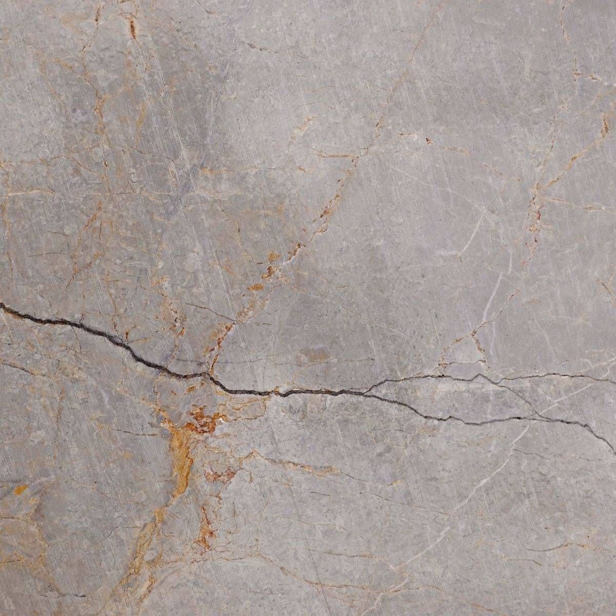 Broken marble pieces before professional repair and restoration in Auckland.