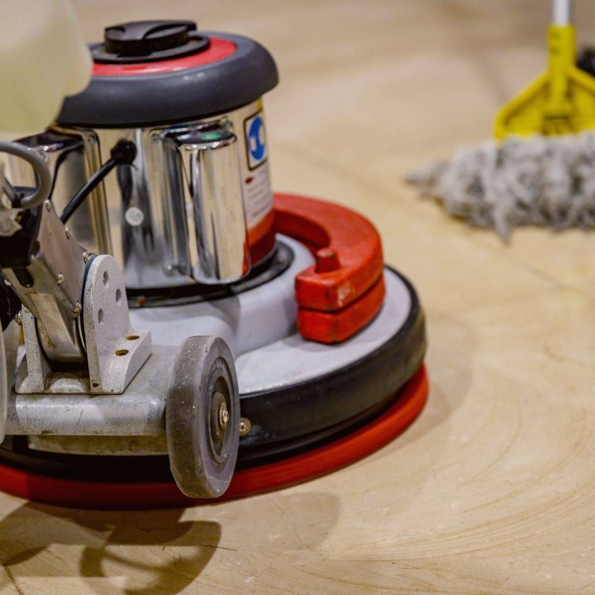 Professional marble floor polishing in progress.