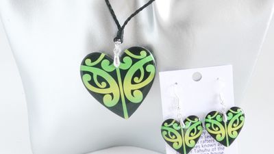 Green and black graphic design resin necklace and earrings