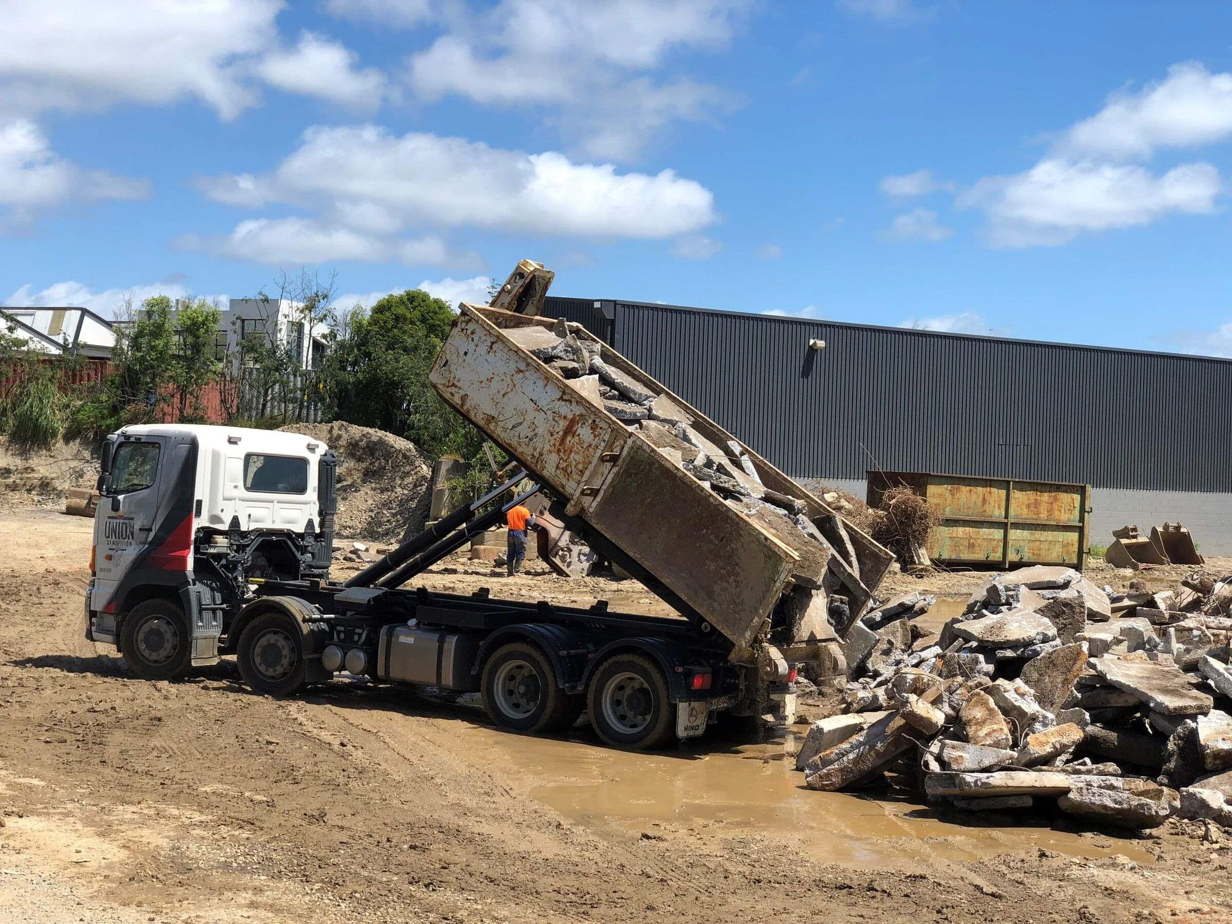 truck tipping waste concret at auckland tipsite
