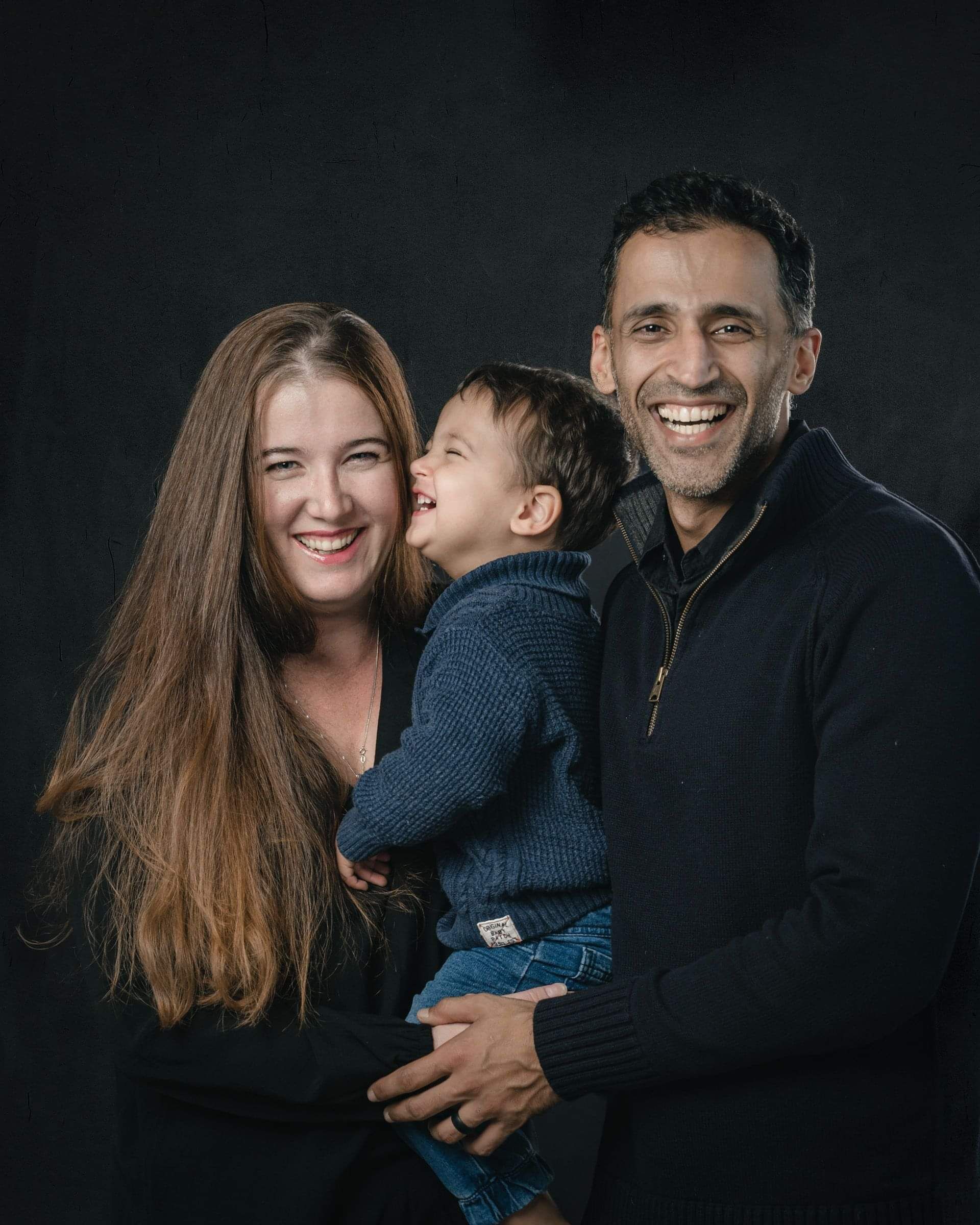 Simple studio portrait of young girl with curly hair 