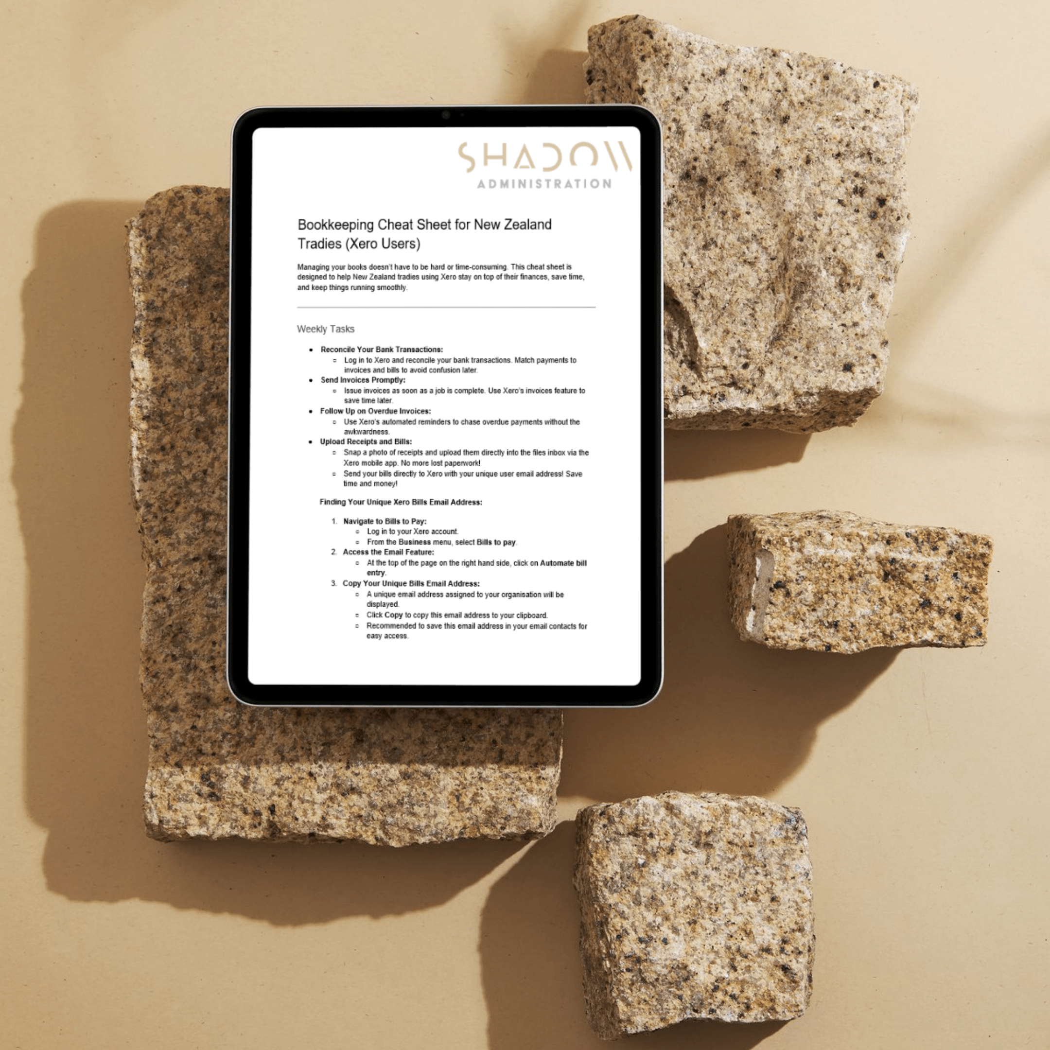 Tablet showing Xero Bookkeeping Cheat Sheet for a trades business
