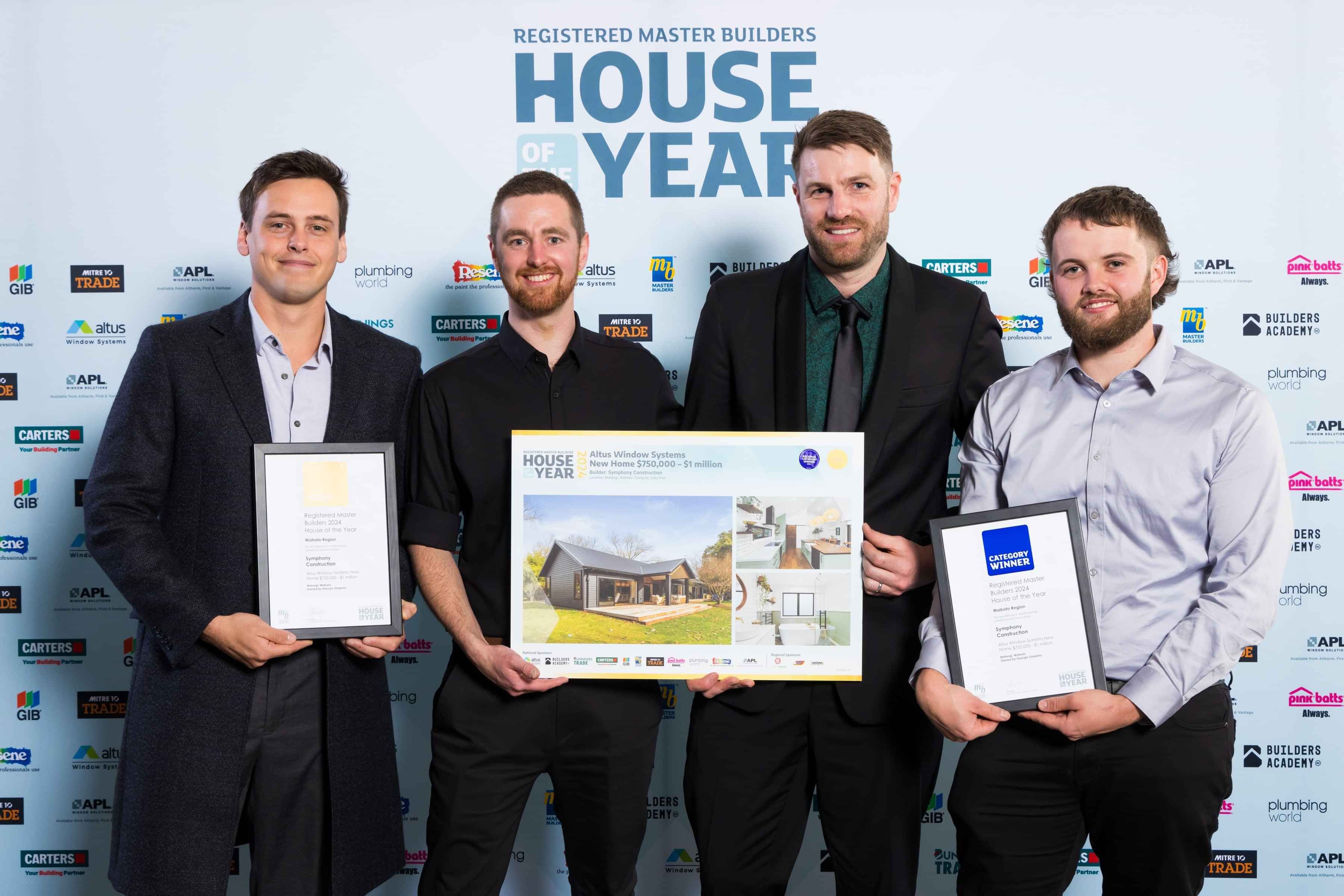 Photo of the Symphony Construction builders with their House of the Year Award