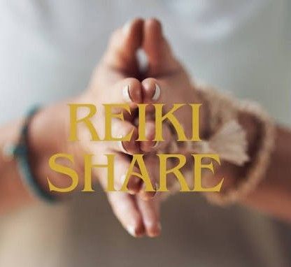 Yolanda sharing a relaxed Reiki treatment with students
