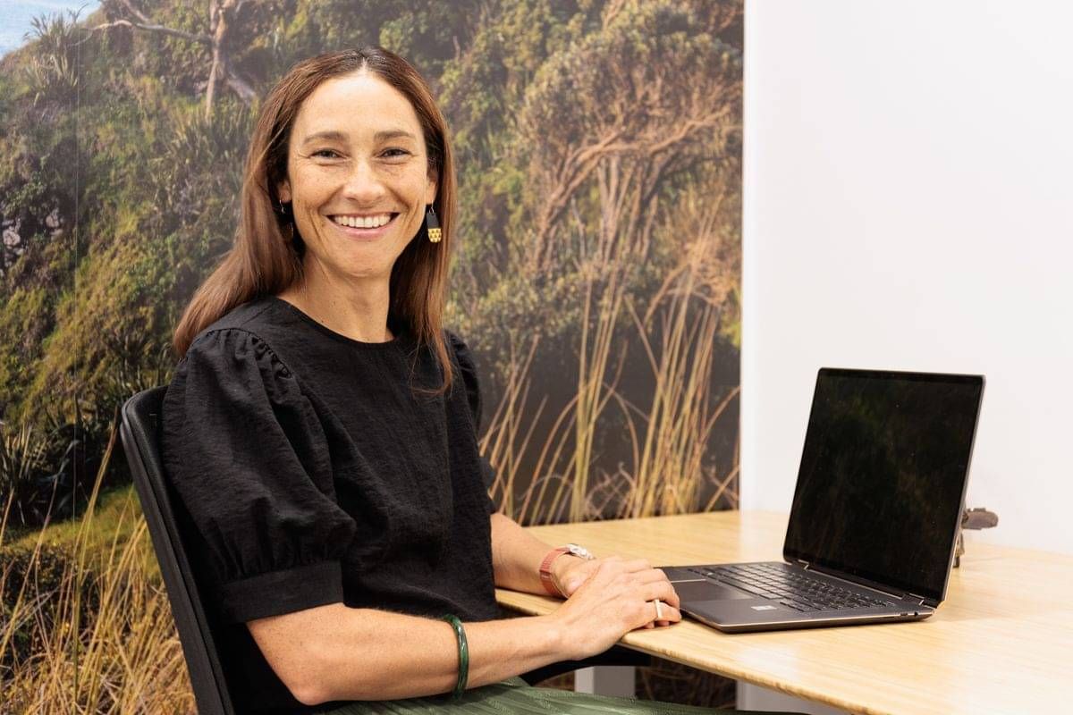 Dr Vanessa Vallely ENT MOSS sitting at desk