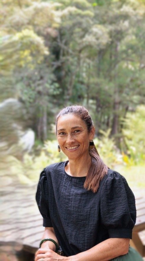 Dr Vanessa Vallely ENT MOSS sitting at desk