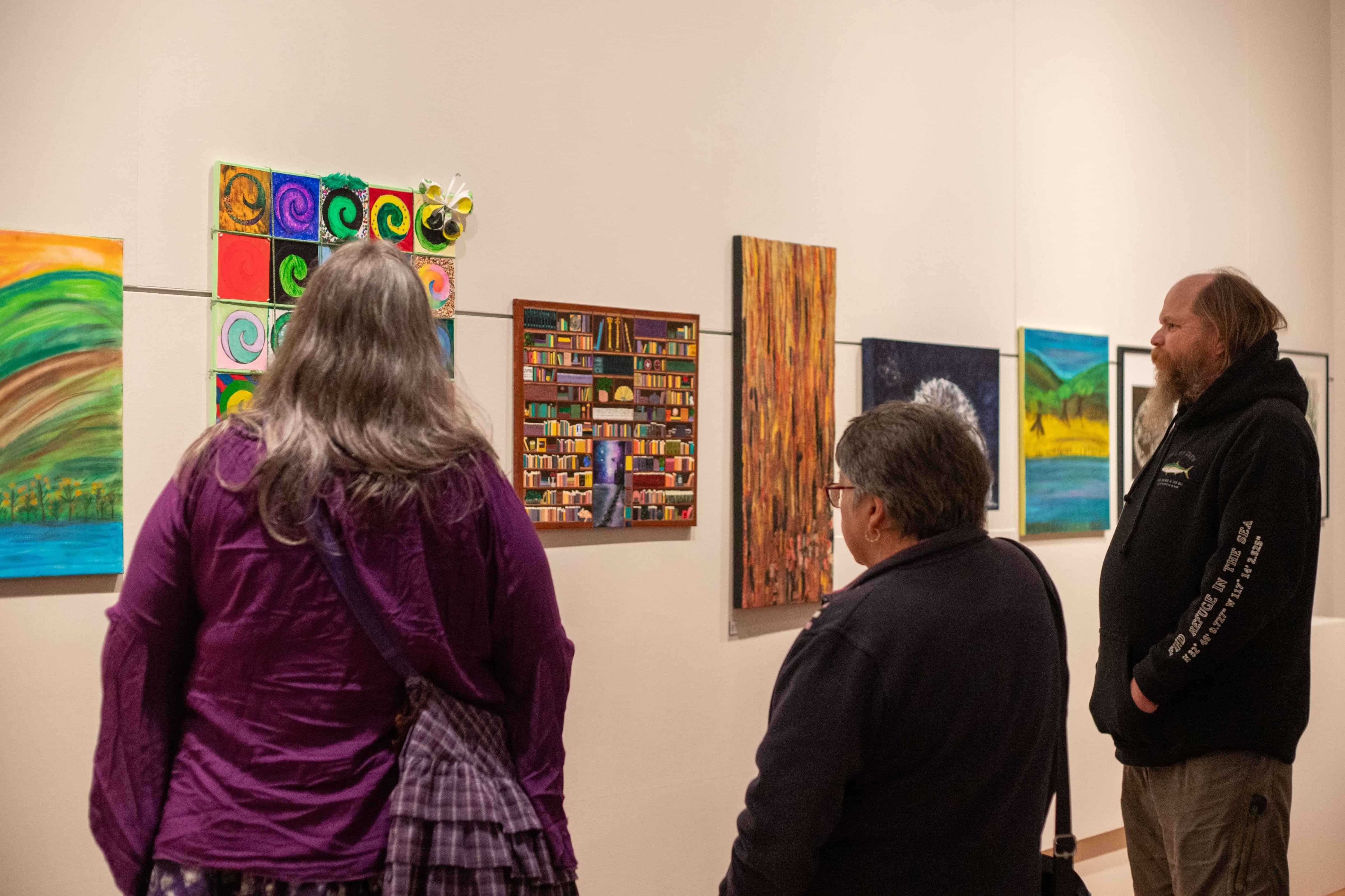 Visitors viewing artwork at the Arts for Health Annual New Zealand Art Competition