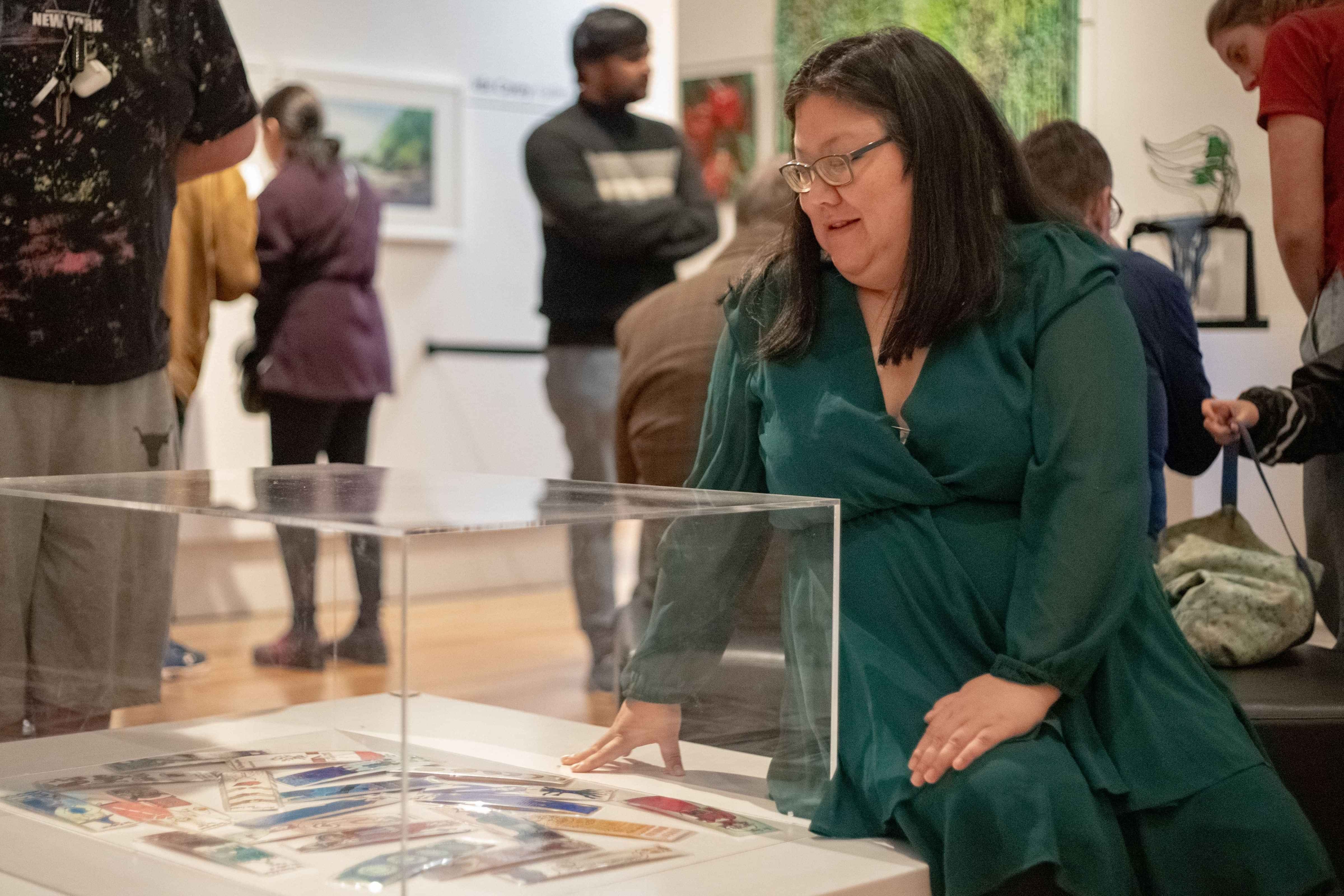 People viewing the Arts for Health Annual New Zealand Art Competition exhibition