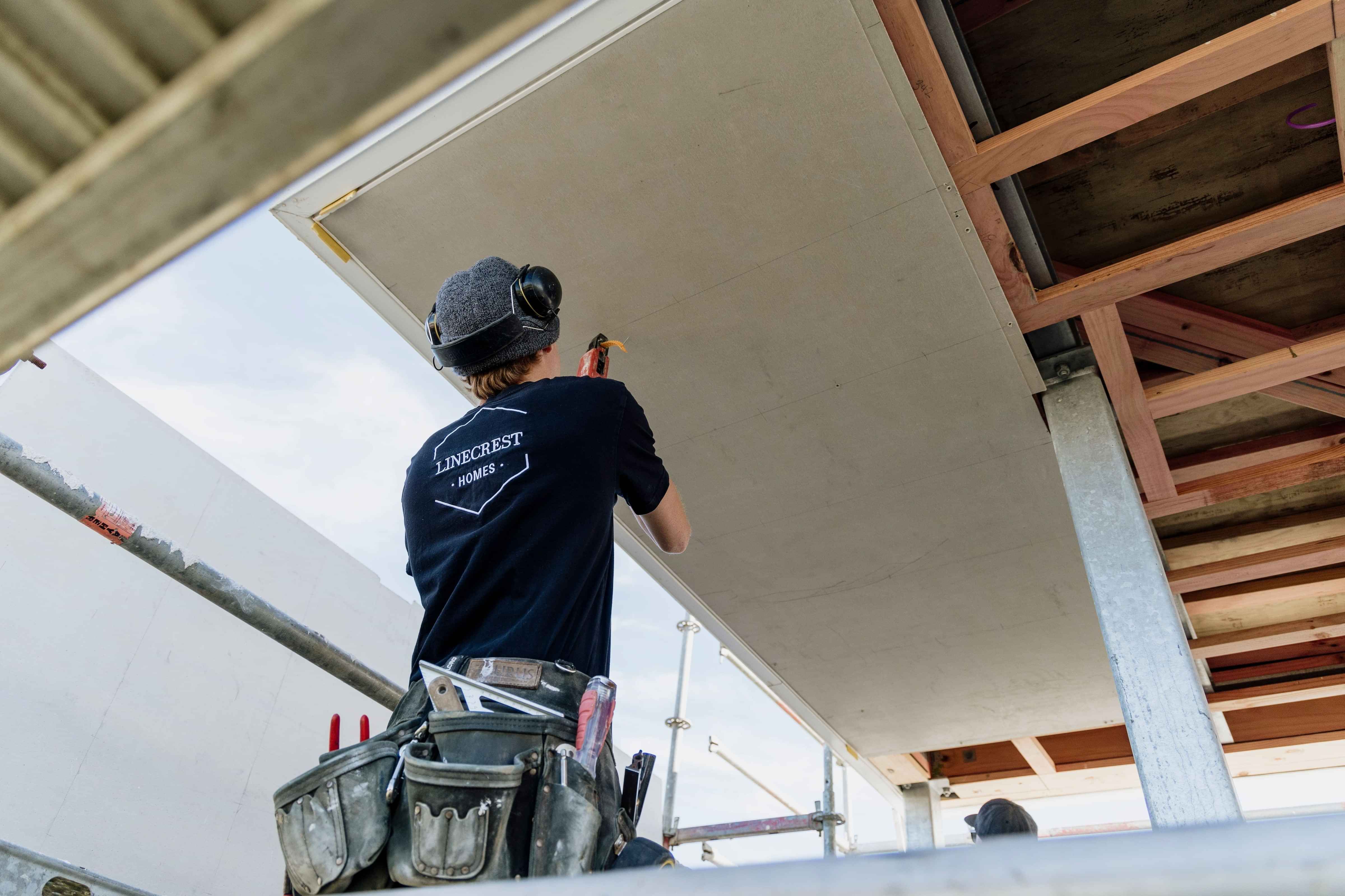 Being a master builder means doing the basics right including nailing the gib in the ceiling.