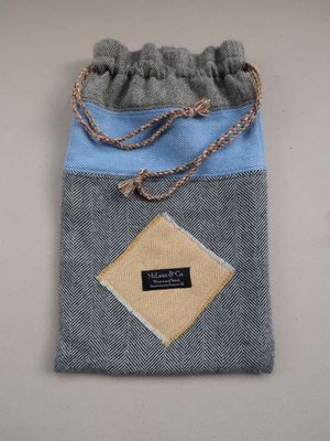 Hot water bottle cover - charcoal herringbone with blue and gold detail