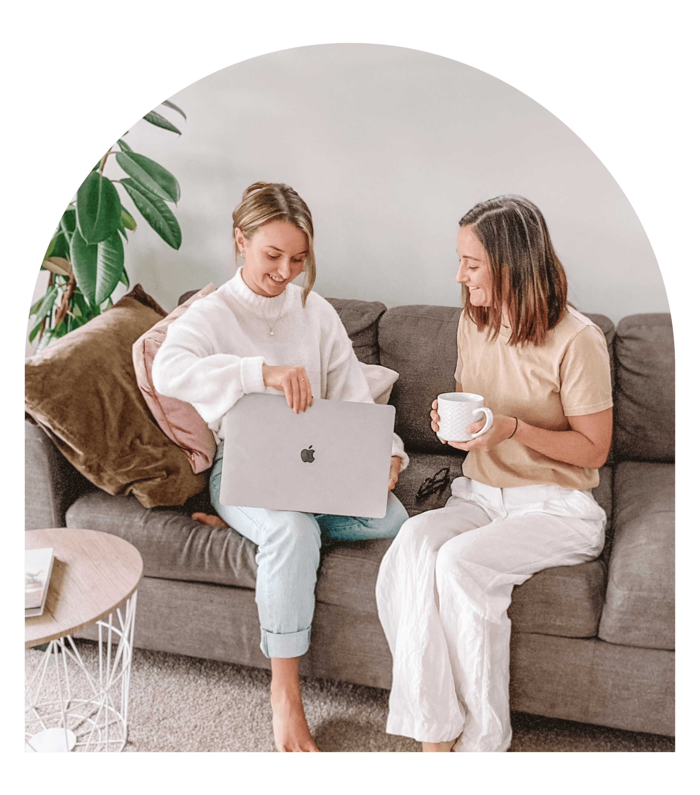 Graphic designer and client sitting on couch