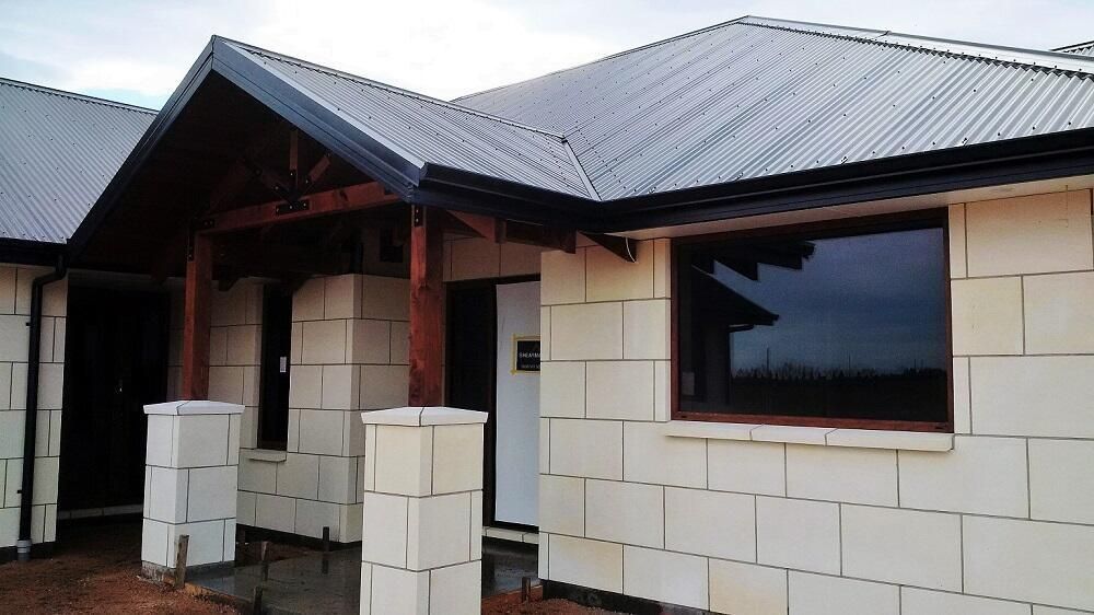 New Oamaru stone house thats been cleaned & sealed