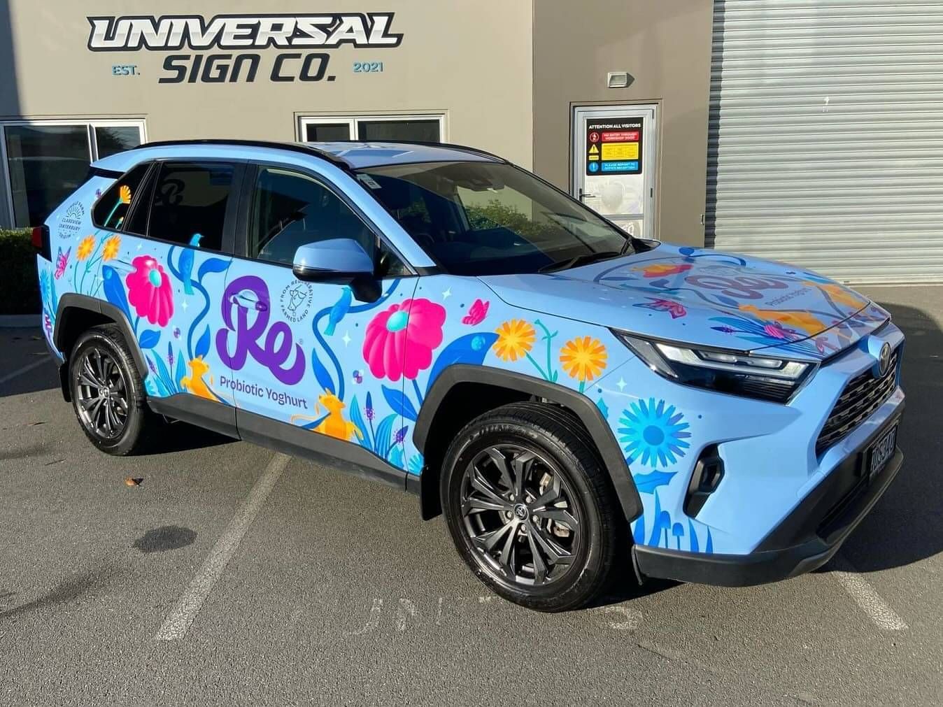 Vehicle signage car wraps produced and installed for fleets by Universal Sign Co