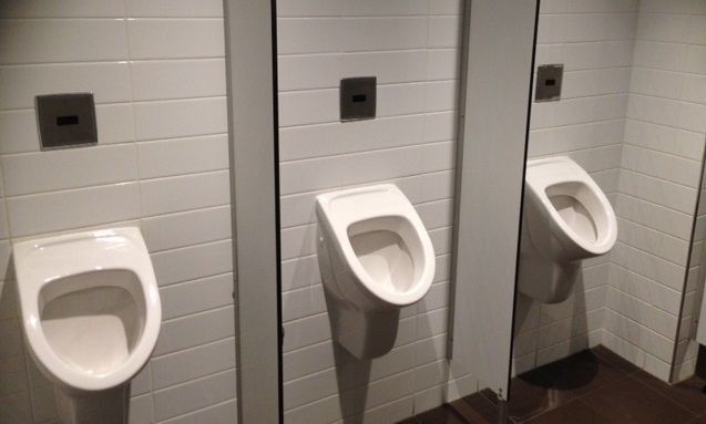 Row of sensor operated urinals and link to Sensor Urinals range.