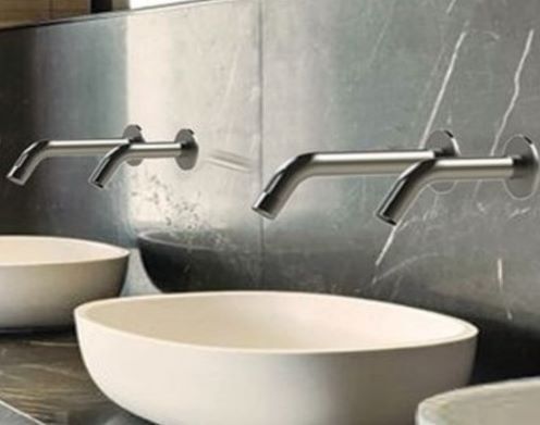 Matching sensor soap dispenser and taps over ceramic sink and link to Sensor soap dispenser range.