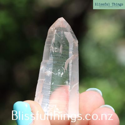 Lemurian quartz Point with cut base.