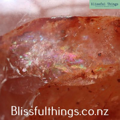 Fire Quartz Sphere with Rainbow Inclusion