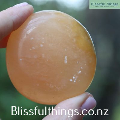 Apricot/Orange Calcite Palm Stone
