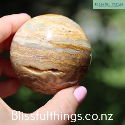 Yellow Crazy Lace Agate Sphere with Pockets of Druse