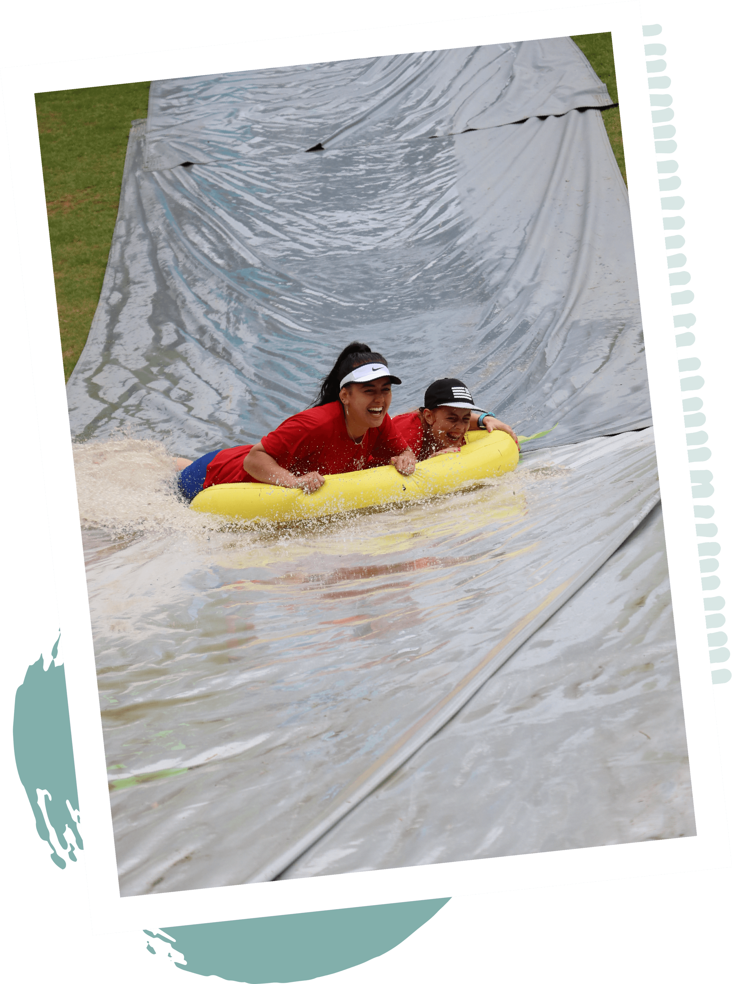 Child and Leader on waterslide