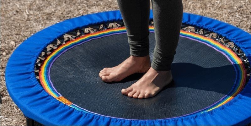 Woman doing the health-bounce on a XenPod Lymphaciser
