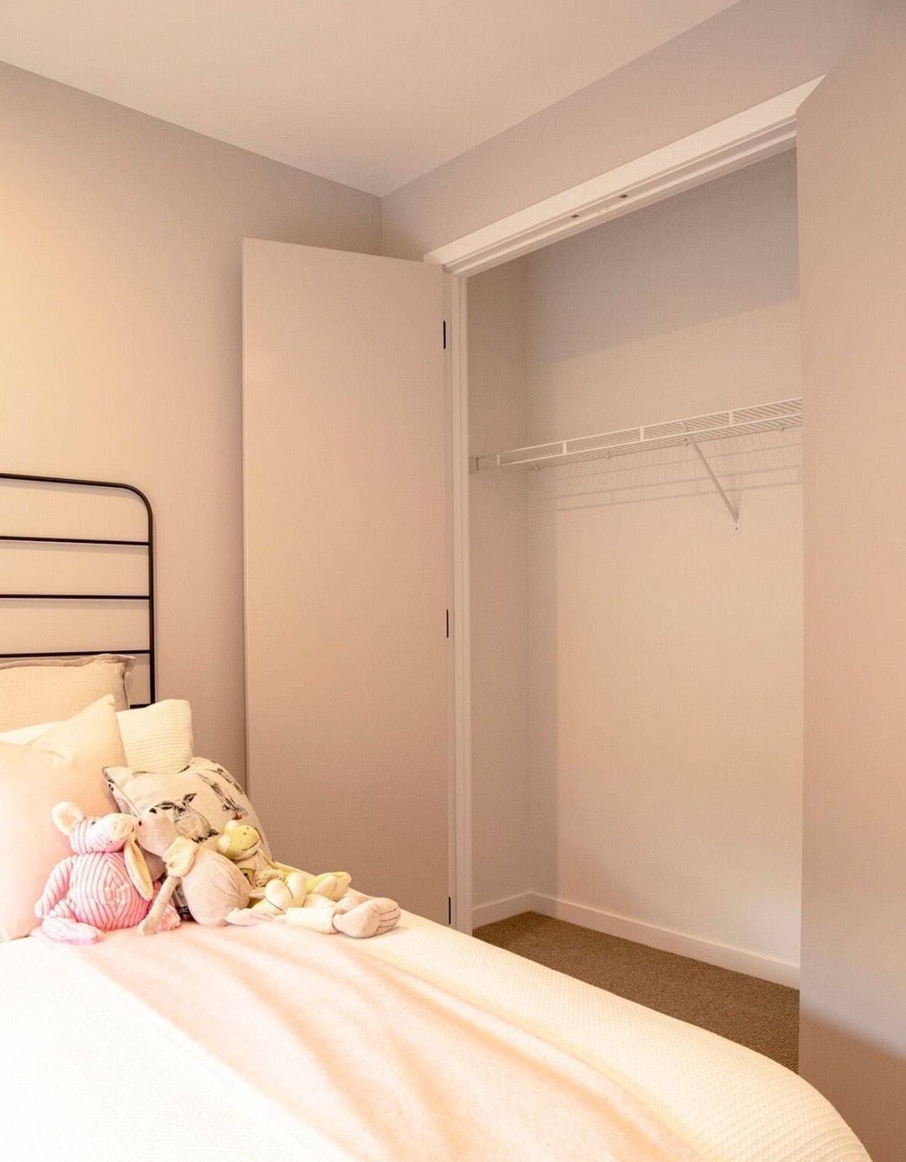 Wire wardrobe with doors.