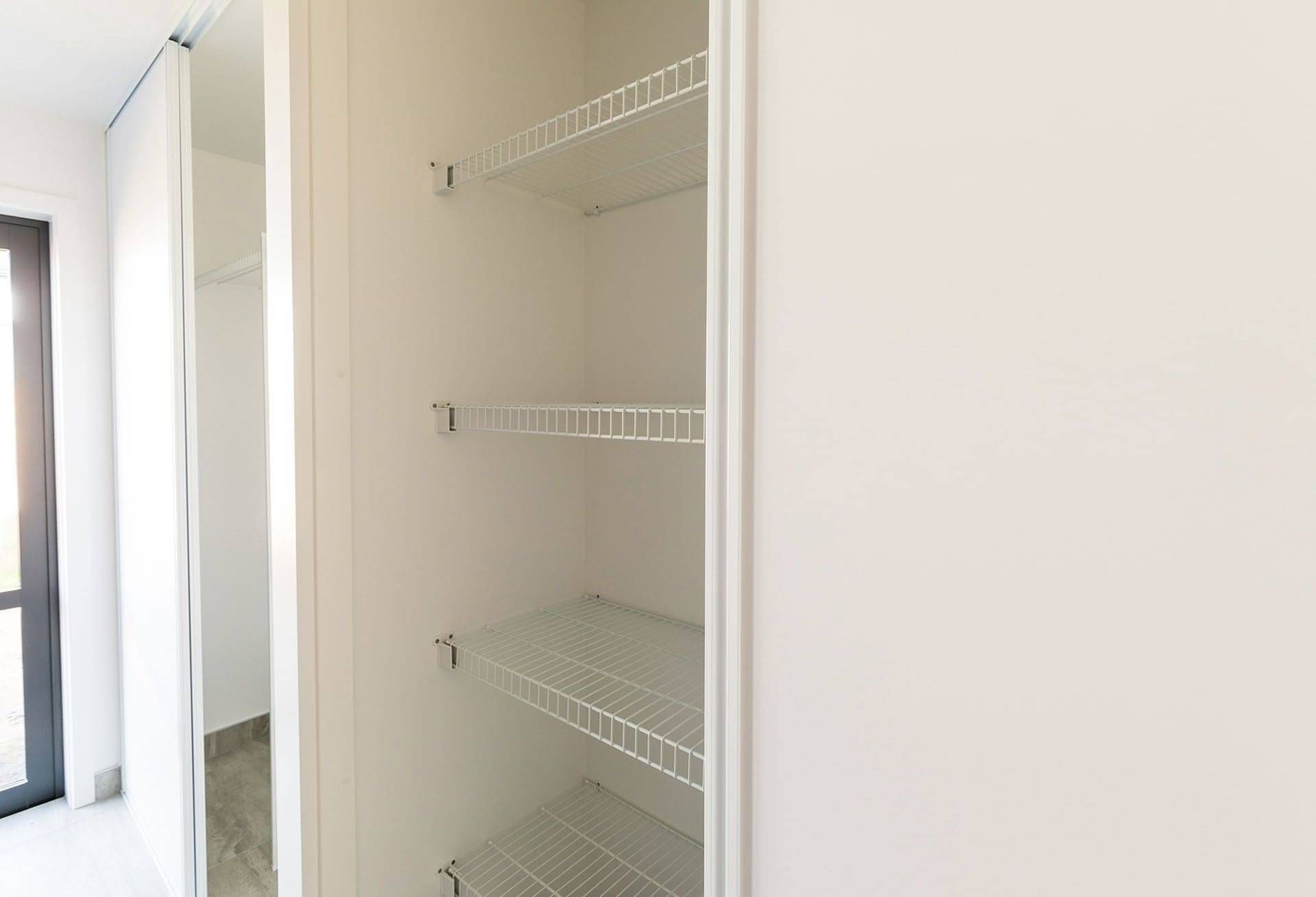 Custom garage shelving using wire shelves.