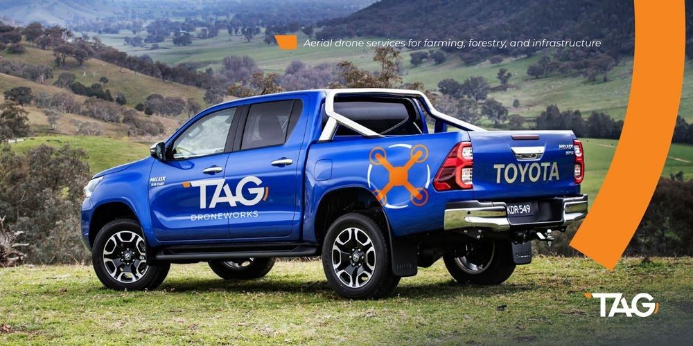 Vehicle signage mockup showing new logo design