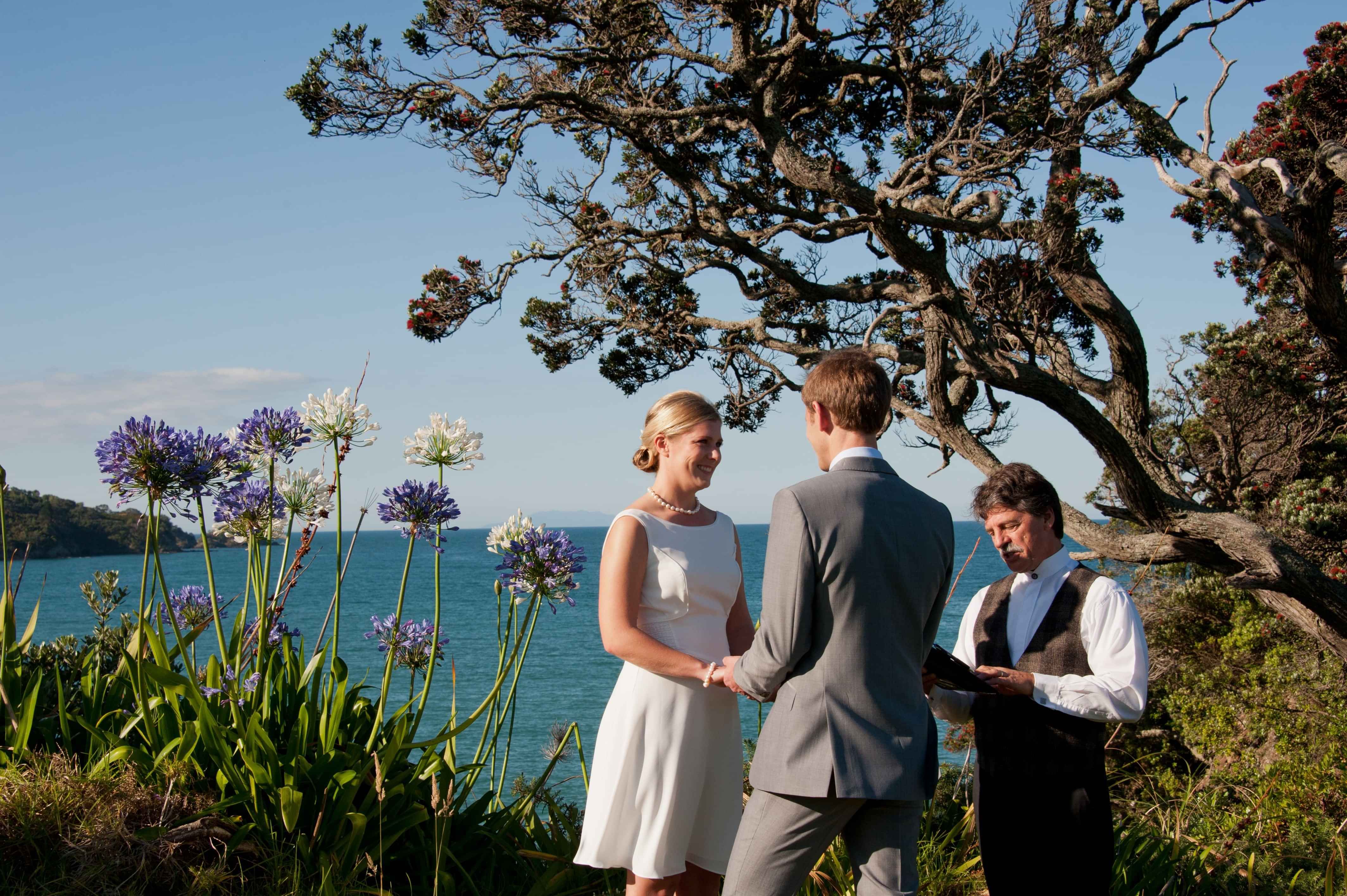 Mark Trubuhovich leading a renewal of vows ceremony outdoors
