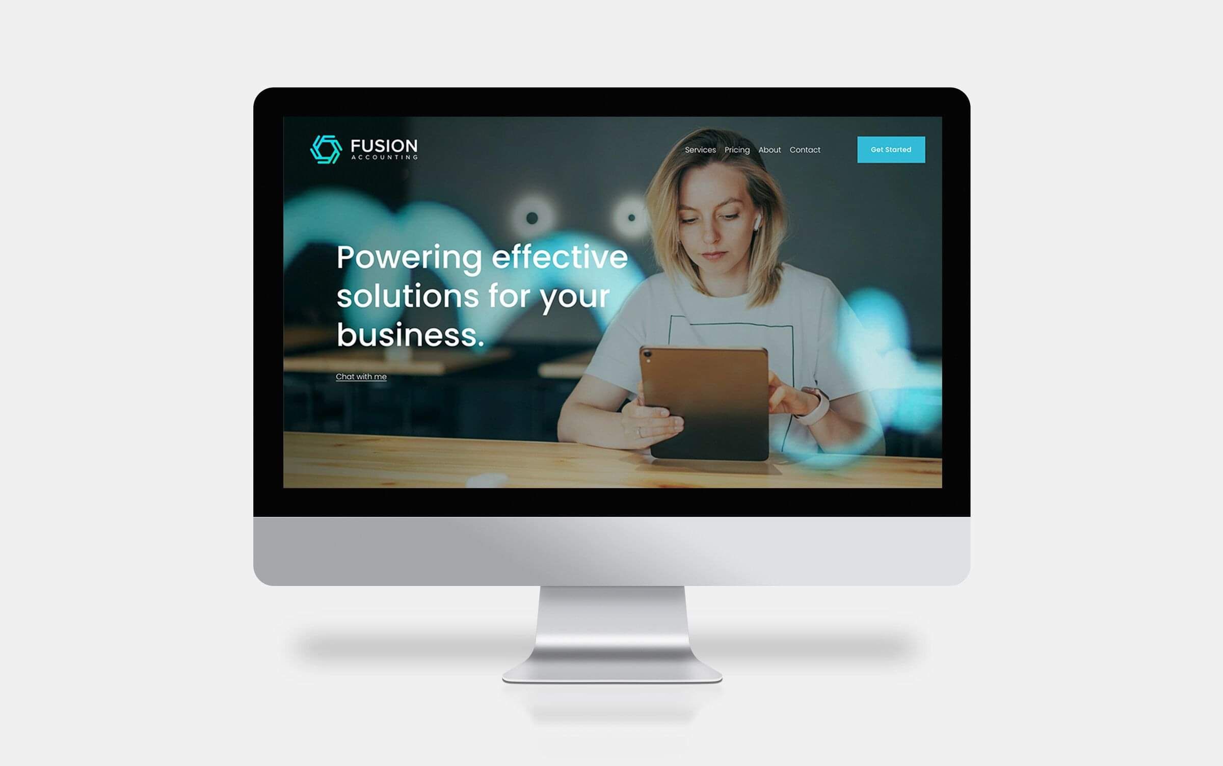 Fusion Accounting website displayed on the desktop computer screen