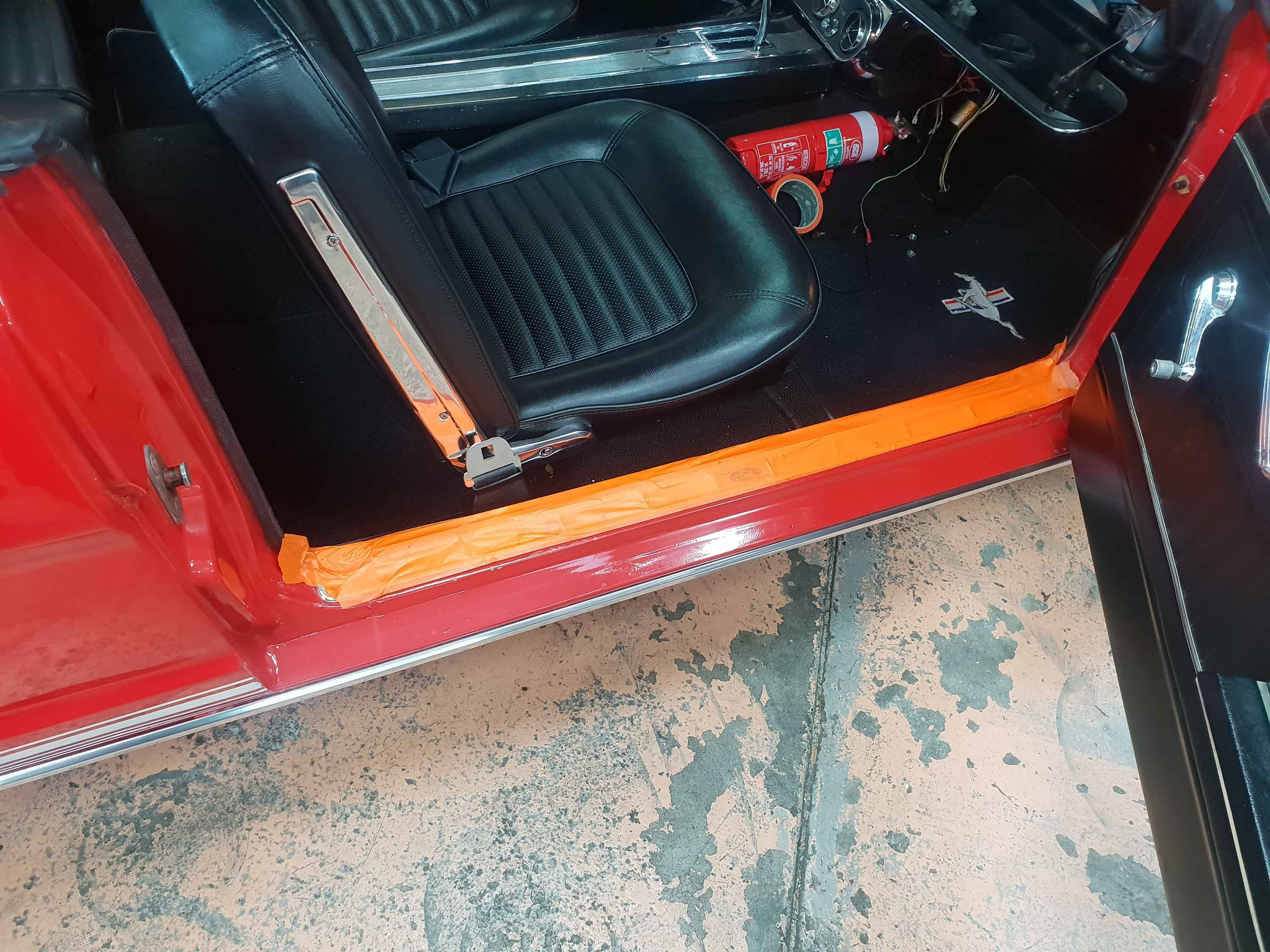 Passenger footwell of classic car - typical location for water leaks. 