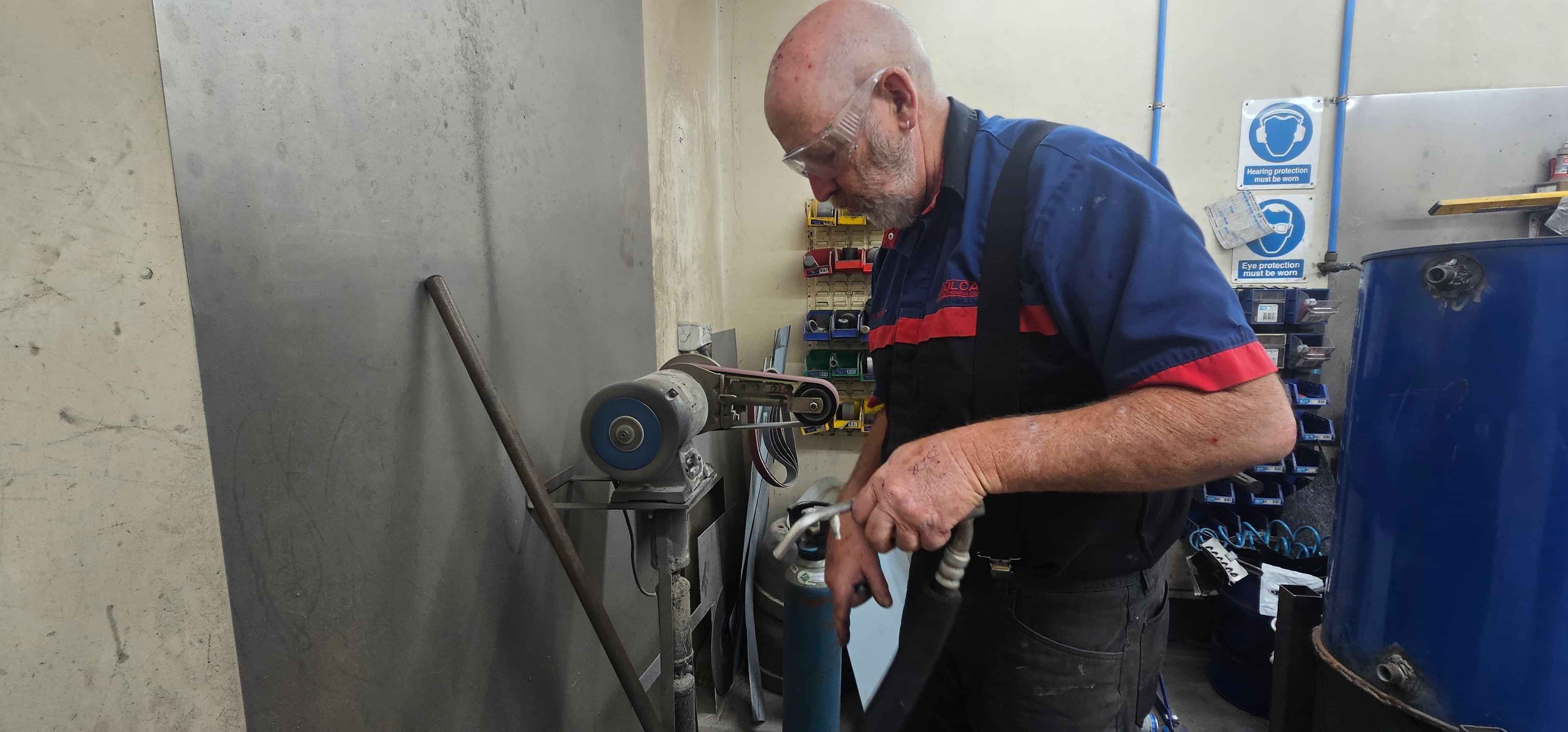 CoolCar Technician fabricating damaged hose to fit vehicle once again