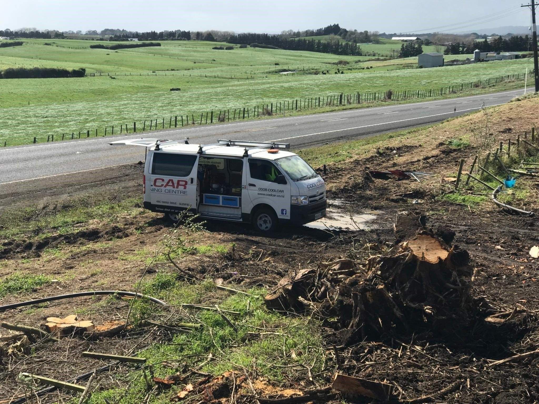 CoolCar North Shore mobile van on farm-site, with tools out ready for work