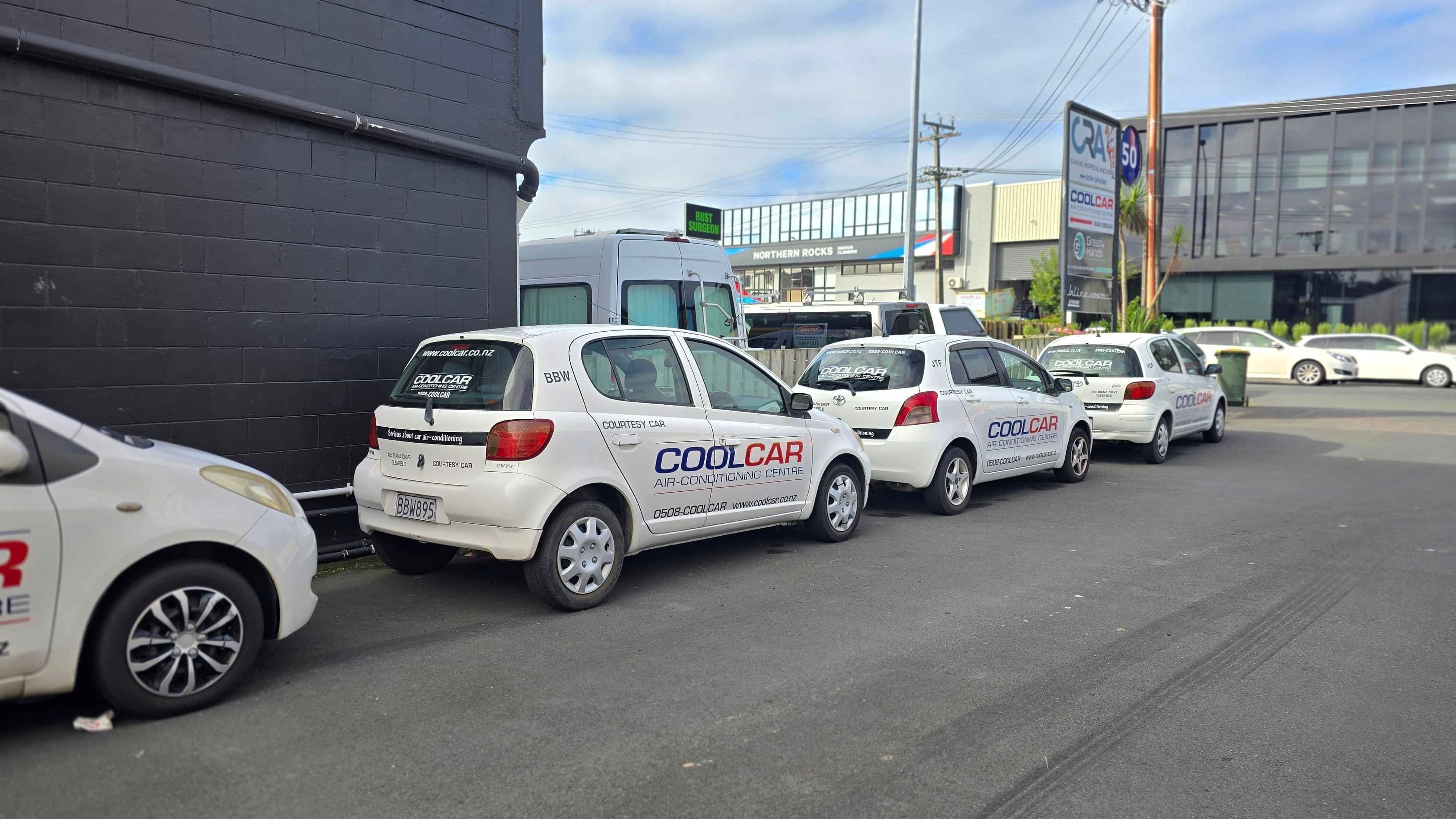 CoolCar Courtesy cars lined up outside North Shore workshop