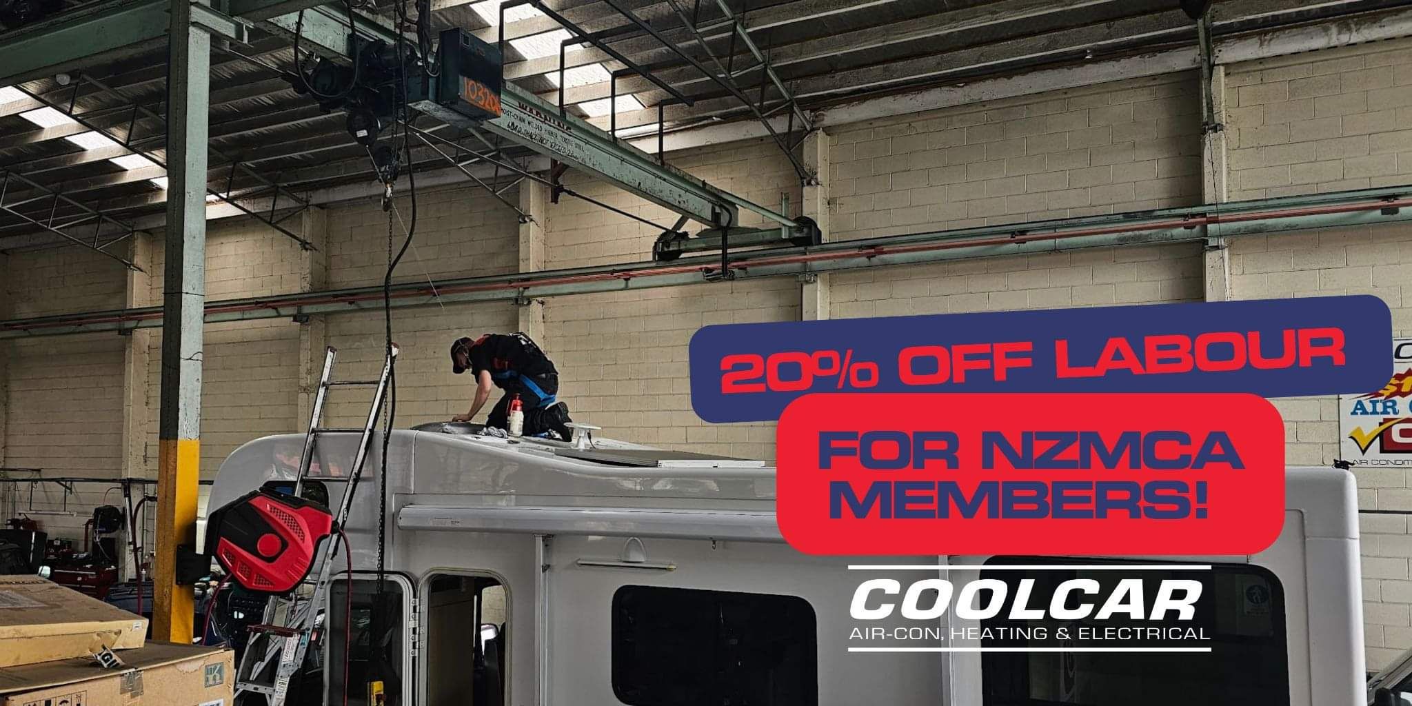 CoolCar technician attached to gantry repairing skylight in motorhome