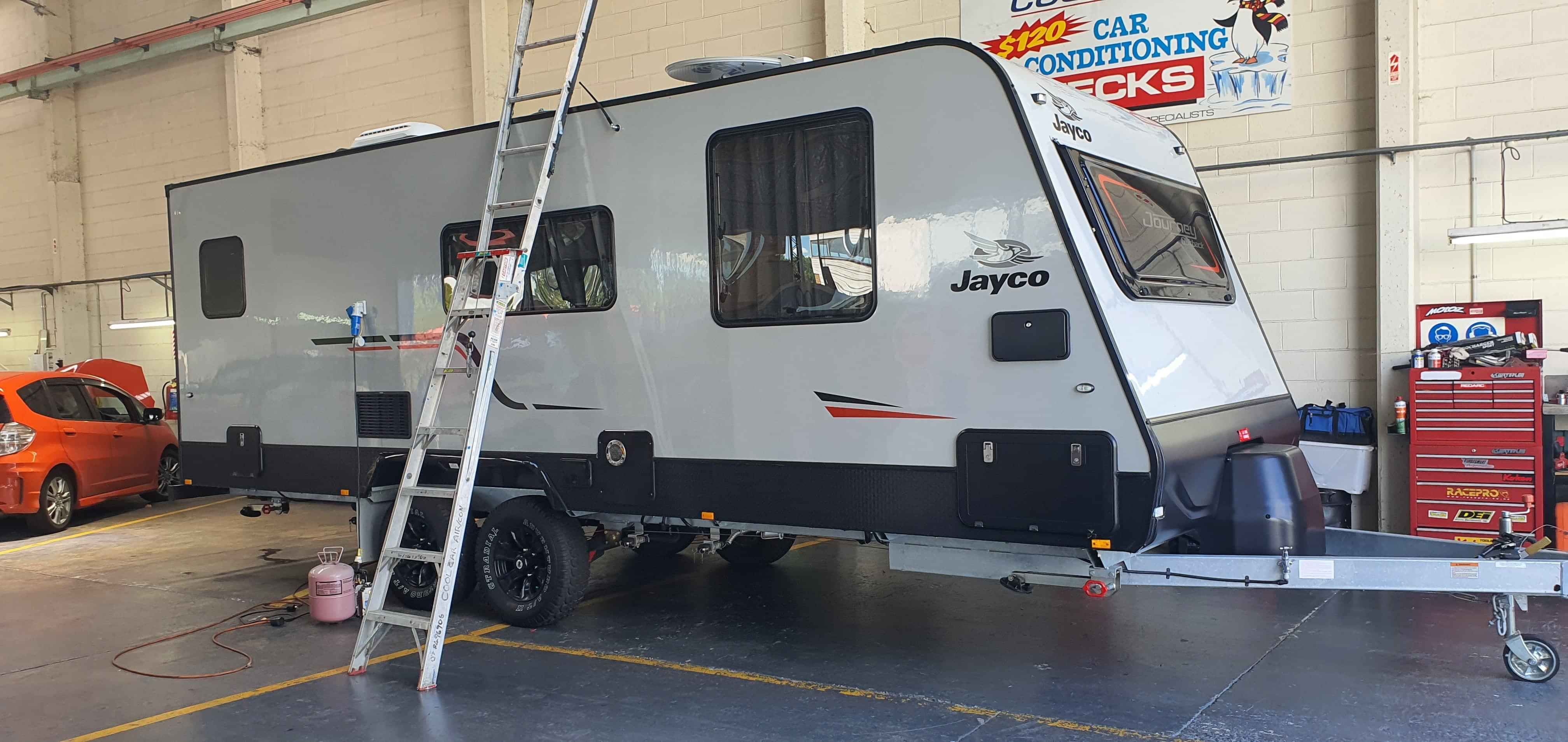 Jayco caravan at CoolCar workshop having gas repairs performed on 3-way fridge.
