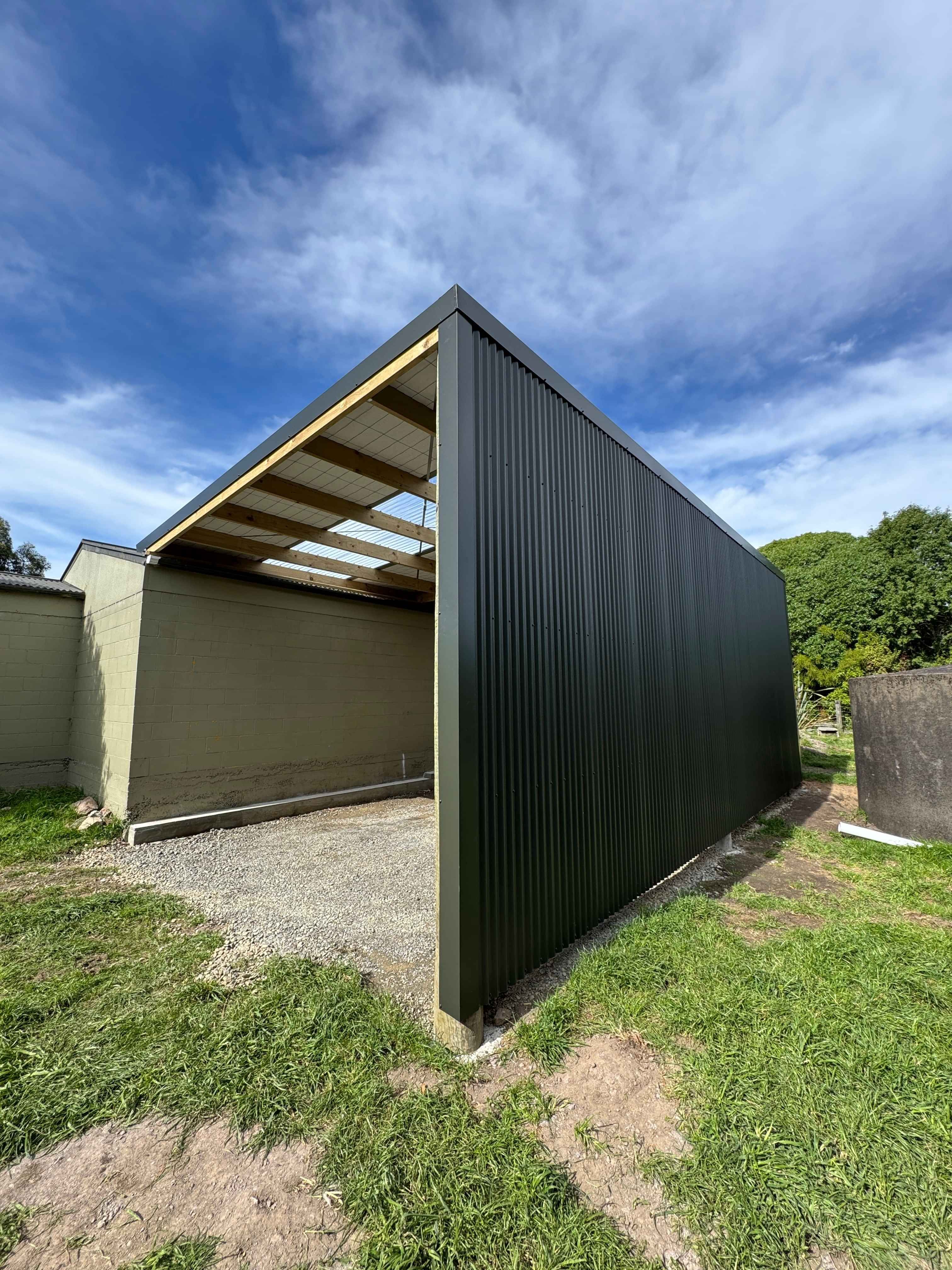 Fully enclosed motorhome shed with Coloursteel cladding