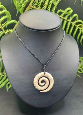 Carved Whale Bone Koru with Korus  WK030