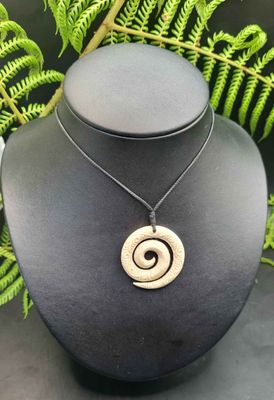 Carved Whale Bone Koru with Korus  WK031